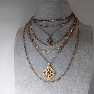 11 inch Express 7 Strand Necklace in GoldTone with Starburst Pendant